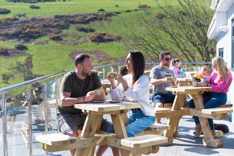 Woolacombe Sands Holiday Park Guests on the Clubhouse Terrace