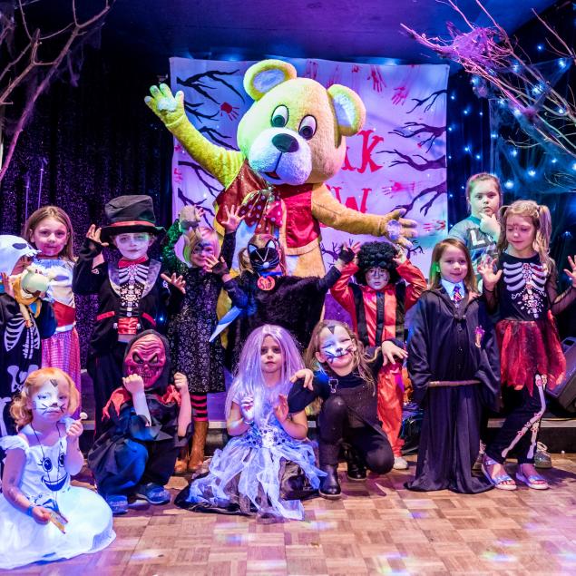 Woolly Bear and children in fancy dress at Woolacombe Sands Holiday Park