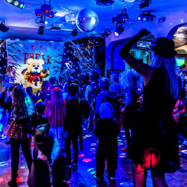 Woolly Bear dancing with children on Halloween at Woolacombe Sands Holiday Park