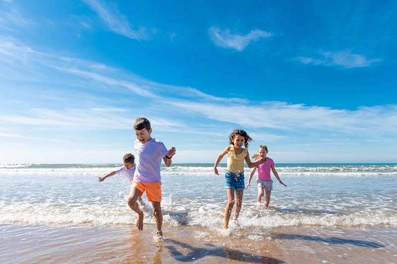 Woolacombe Sands Holiday Park Children running on the beach