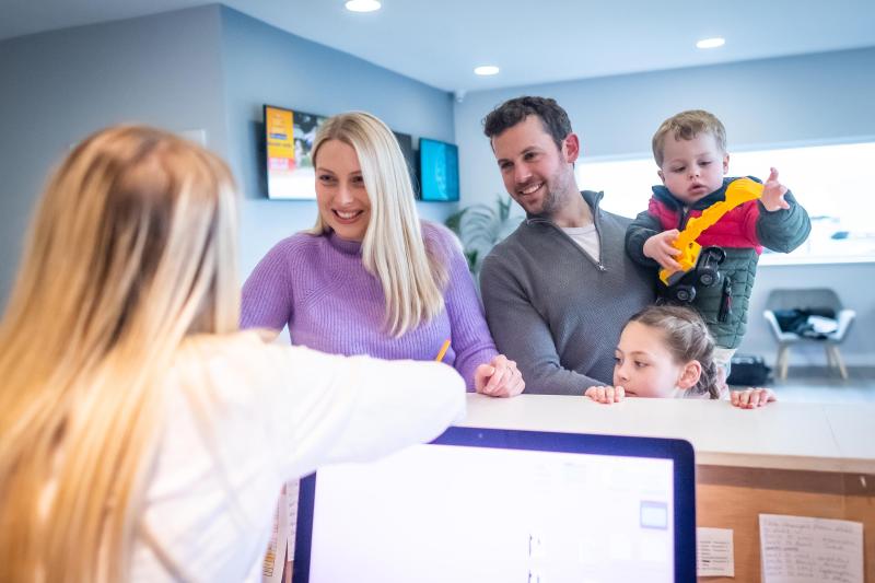 Woolacombe Sands Holiday Park Family Checking In at Reception