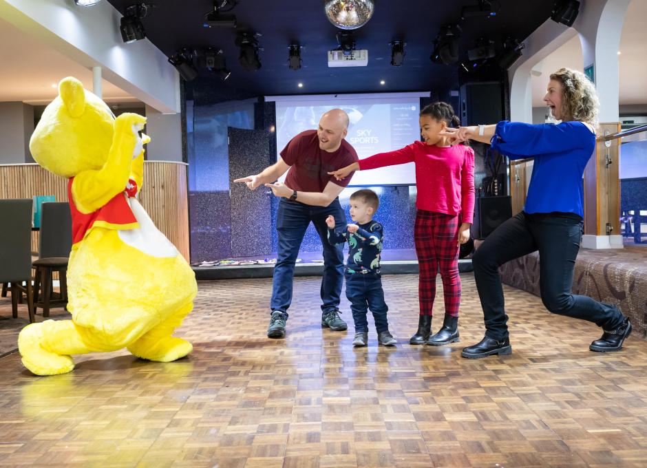 Woolacombe Sands Holiday Park Woolly Bear Entertaining Guests in the Clubhouse