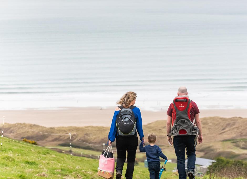 Woolacombe Sands Holiday Park Guests on Footpath To Beach