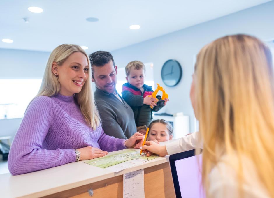 Woolacombe Sands Holiday Park Family Checking In at Reception