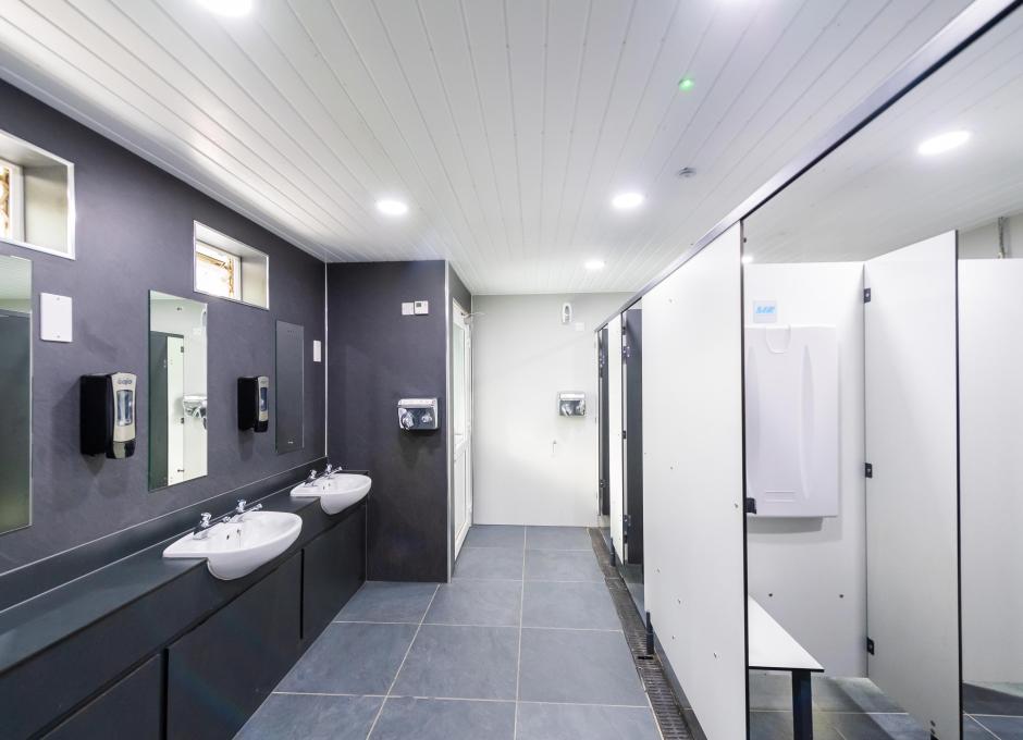 An internal view of the Avenue 10 shower block at Woolacombe Sands Holiday Park